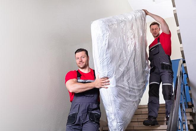 household clutter being cleared with box spring removal in Kildeer